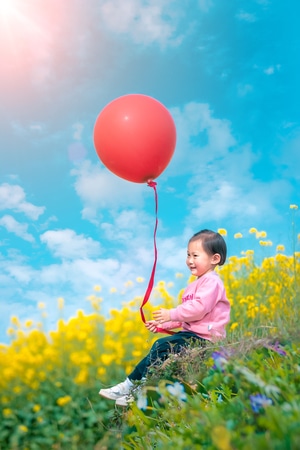 快乐-油菜花-小孩-笑容-人像 图片素材