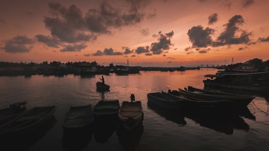 夕陽-海浪-海-漁船-晚霞 图片素材