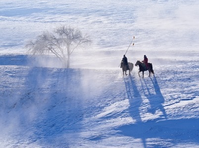 大雪-草原-寒冬-牧马人-牧马人 图片素材