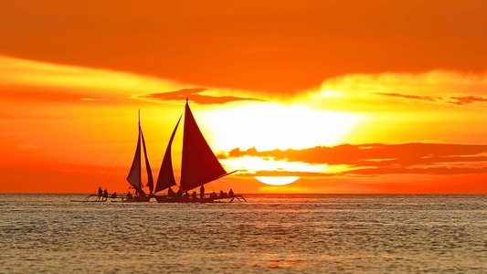 宅家-大海-夕阳-日落风帆-跟焦拍摄 图片素材