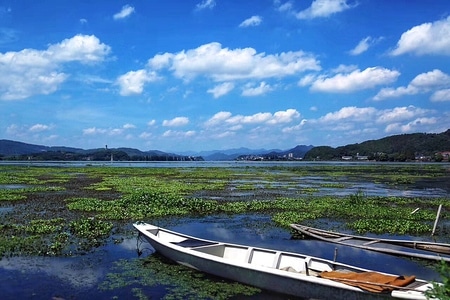 旅行-九姓渔村-人像-船-独木舟 图片素材