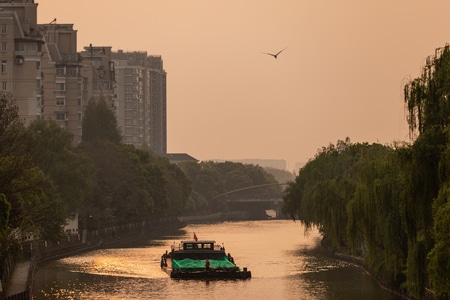 杭州-余杭塘河-货船-日落-城市 图片素材