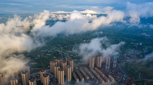 城市-阳光-云海-高视角-航拍 图片素材