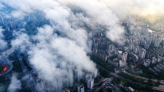 城市-阳光-云海-高视角-航拍 图片素材