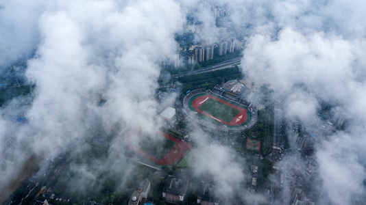 城市-阳光-云海-高视角-航拍 图片素材